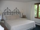 Bedroom with queen wrought iron